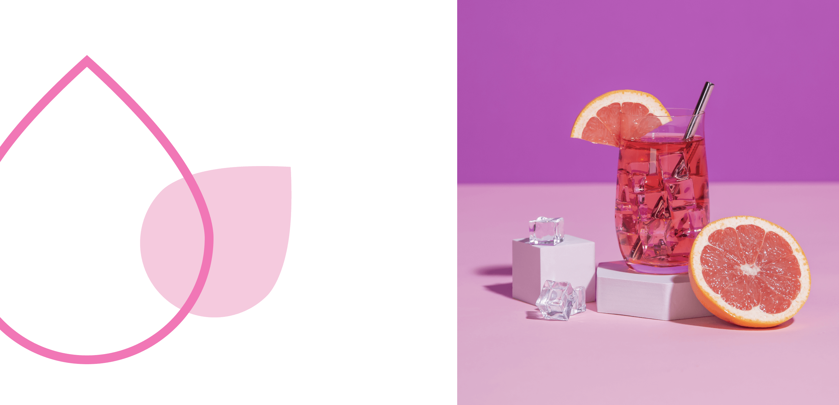 Un cocktail couleur pamplemousse vif avec une moitié de pamplemousse coupée rouge rubis.